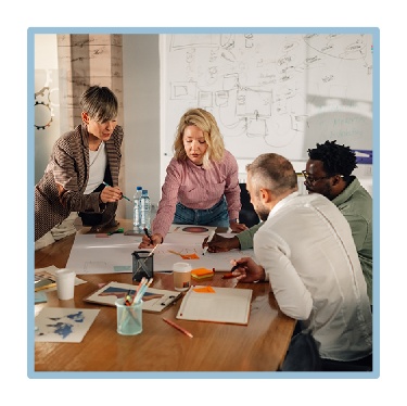 A group of people having a meeting. 
