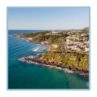 A coastal landscape of a beach town. 