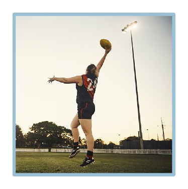 A person playing football. 